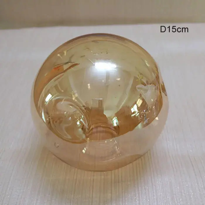 Modern gray glass shade replacement bedroom lamp cover in translucent amber glass with smooth rounded surface and swirls