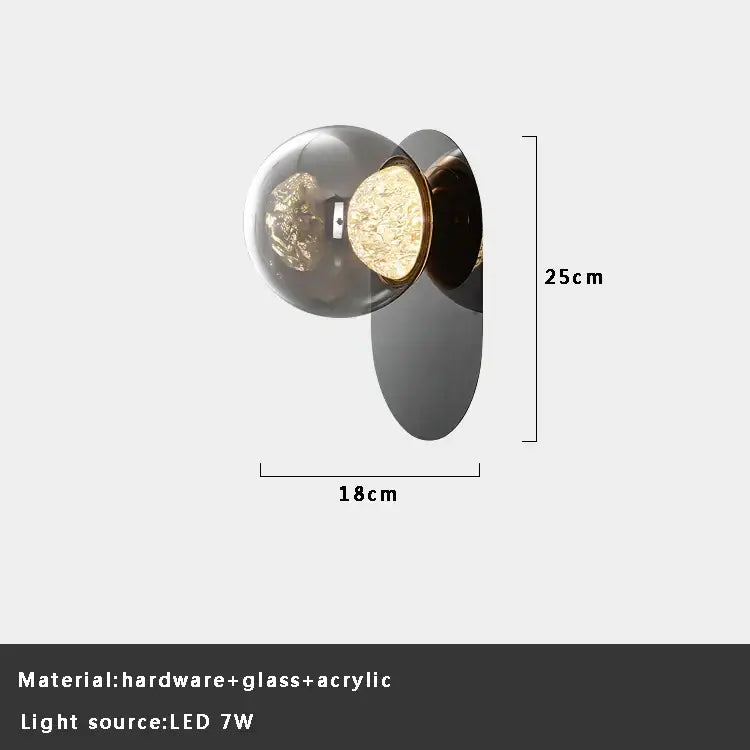 Modern gray glass wall lights featuring a spherical frosted glass globe and metallic base led wall sconce