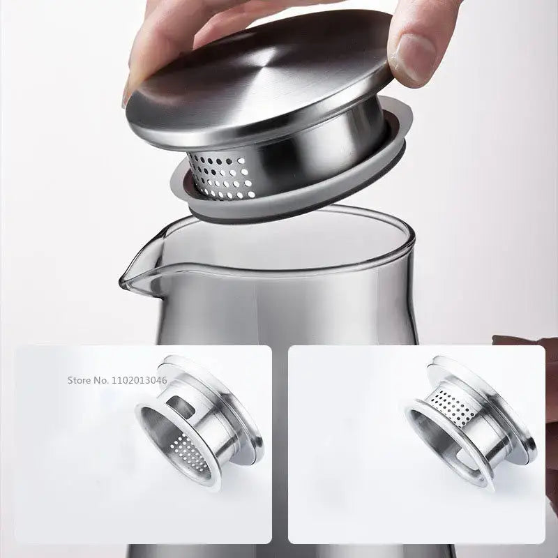Modern gray glass water pitcher with stainless lid and stainless steel perforated tea infuser for brewing glass water