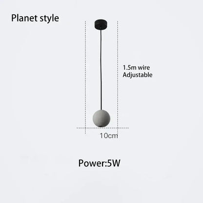 Minimalist modern gray and gold decorbites cement chandelier with matte gray spherical shade and black adjustable wire pendant light