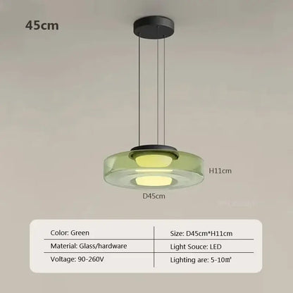 Modern gray and green tiered glass pendant light with green glass pendant and black hardware for dining room use
