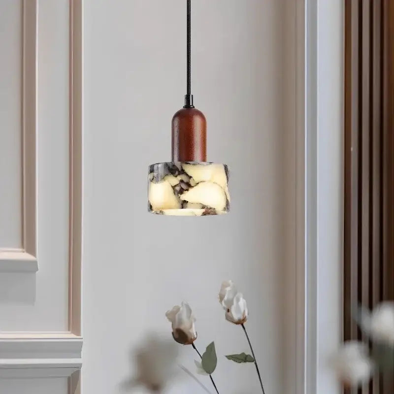 Modern gray marble natural stone pendant light with warm wood top and cord pendant installation for dining room