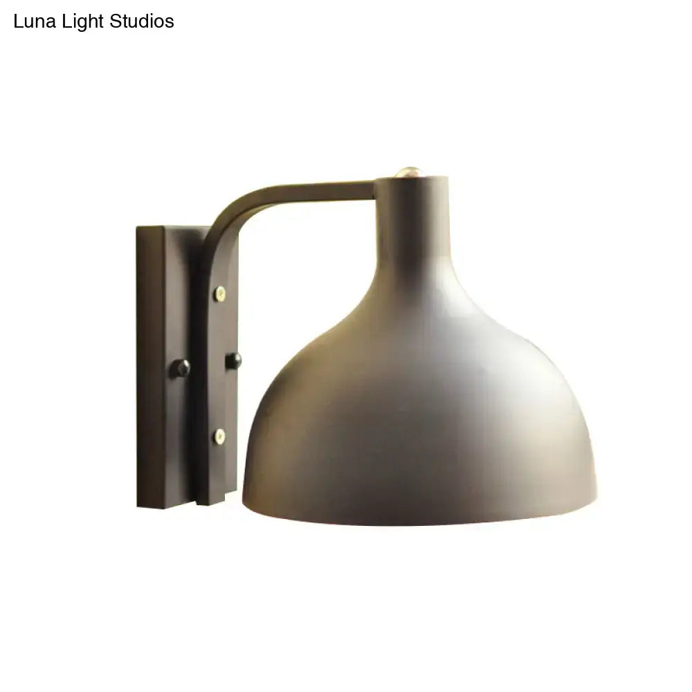 Matte bronze-finished modern gray metal domed wall sconce with curved arm for adjustable hallway lighting