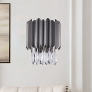 Modern gray metallic wall sconce with cascading crystal teardrop droplets for bedroom lighting