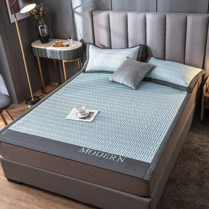 Light blue quilted cooling latex bed mat with gray border and modern embroidery for bedroom use
