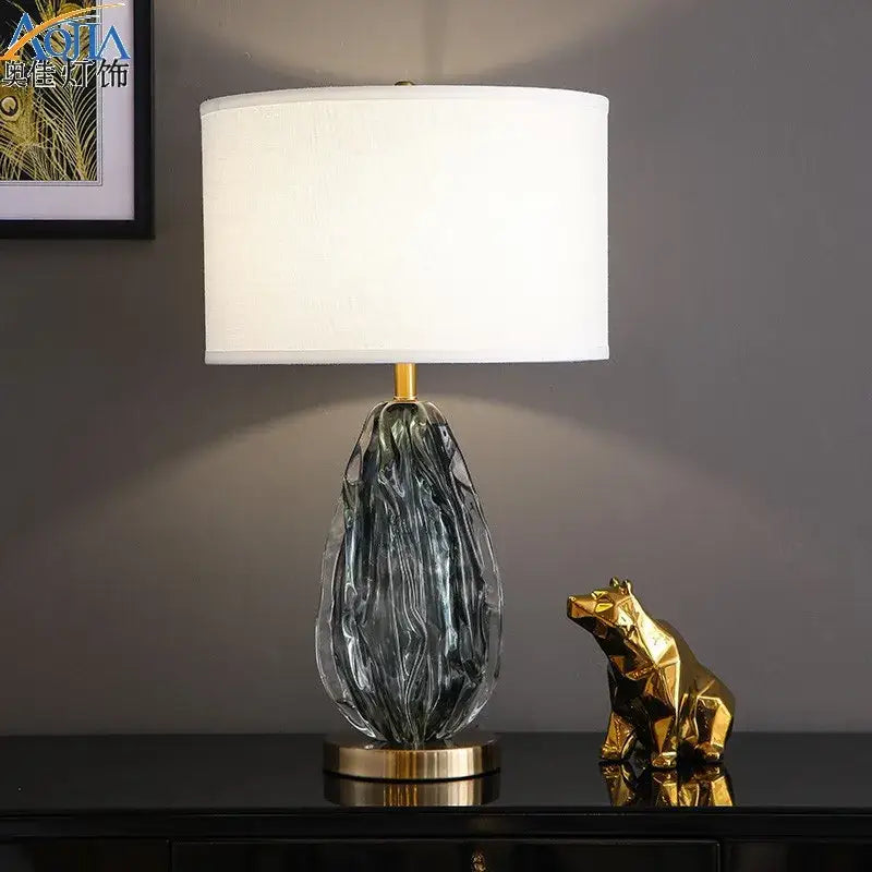 Modern gray swirl crystal table lamp with translucent glass and gold-toned base for bedroom night light decorbites crystal table lamp
