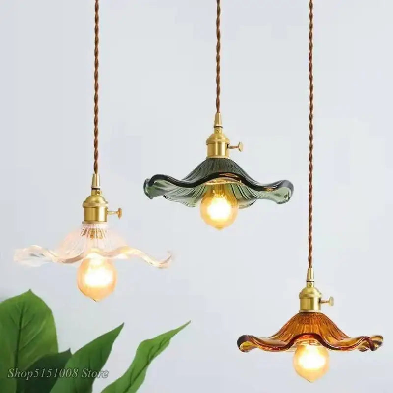 Three hanging glass pendant lights with brass fixtures translucent green and amber colorful glass for dining room cord pendant installation