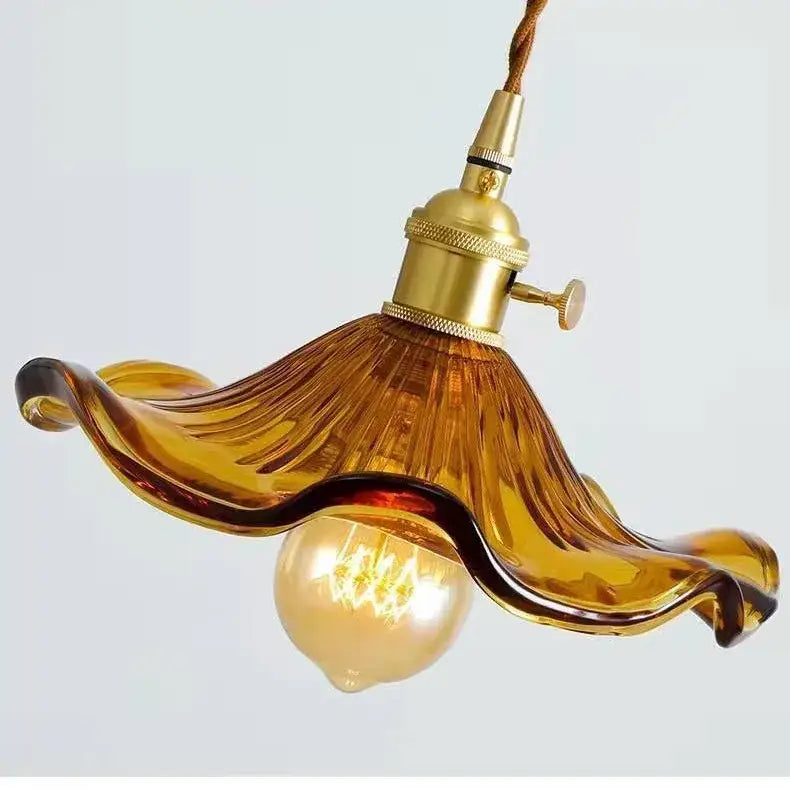 Modern green and amber colorful glass pendant light with amber glass, brass socket, and cord pendant installation