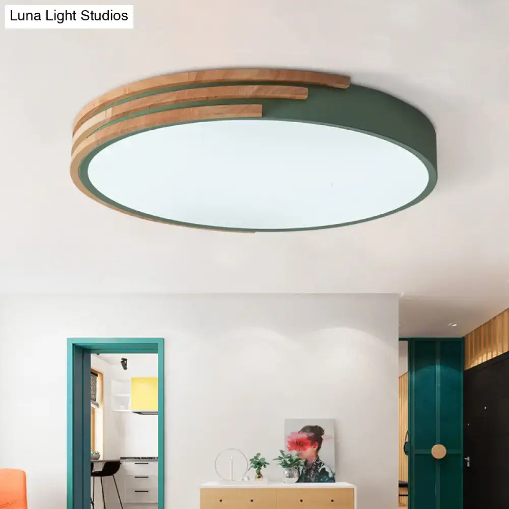 Modern decorbites™ nordic style round flush mount ceiling light with matte green ring and natural wood slats emitting soft white light