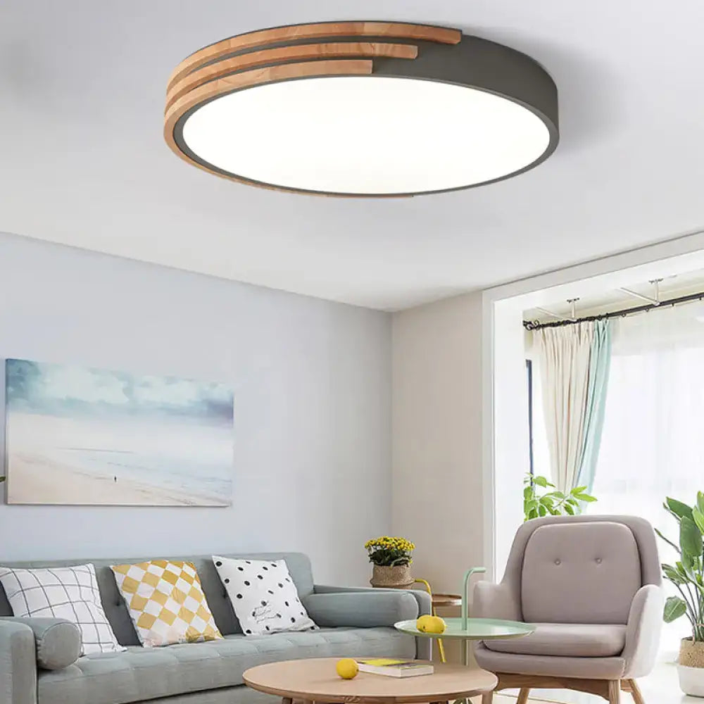 Decorbites nordic style round flush mount ceiling light with dark gray metal frame and warm wood slats edge