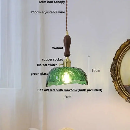 Modern green glass walnut wood pendant light with textured glass, walnut handle, and brass hardware for dining room