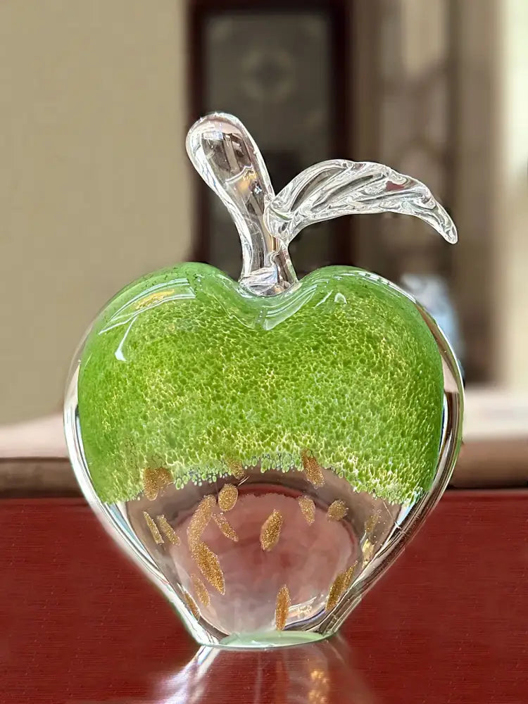 Translucent green crystal glass apple paperweight with gold speckles and clear stem for modern office decorbites crystal glass decor