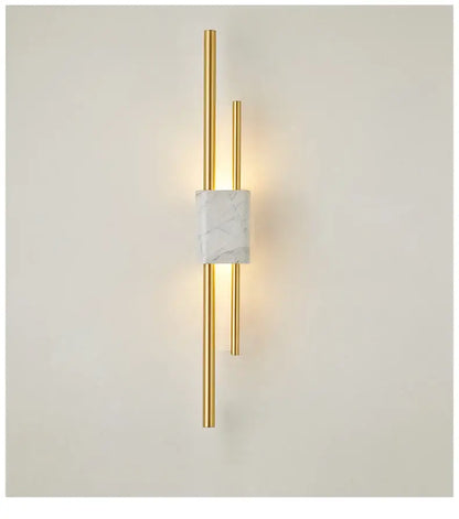 Modern gold-toned wall lamp with central white marble accent and two vertical rods for decorbites light luxury decor