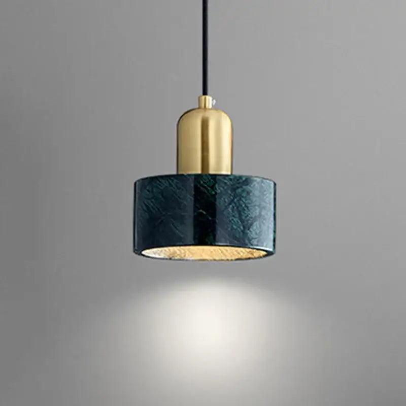 Modern pendant light with green marble cylindrical shade and polished brass top by decorbites for dining room decor