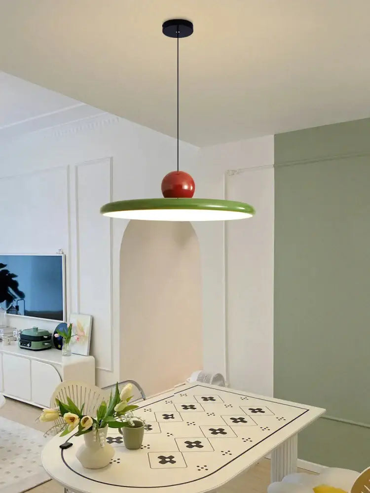 Modern green and red colorful metal led pendant light with sleek circular shade and glossy spherical top for kitchen decorbites pendant lights