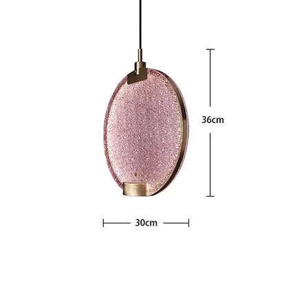 Delicate oval pendant light with sparkling pink glass shade and brass accents by decorbites brass pendant light