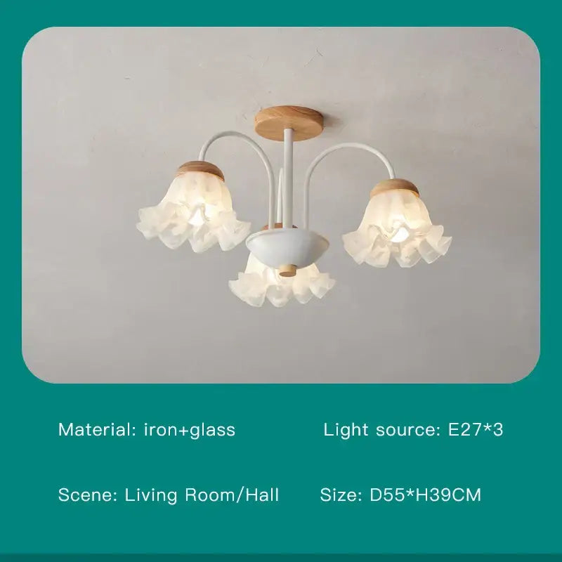 White chandelier ceiling light with wood tones and ruffled glass shades in modern green white chandelier style