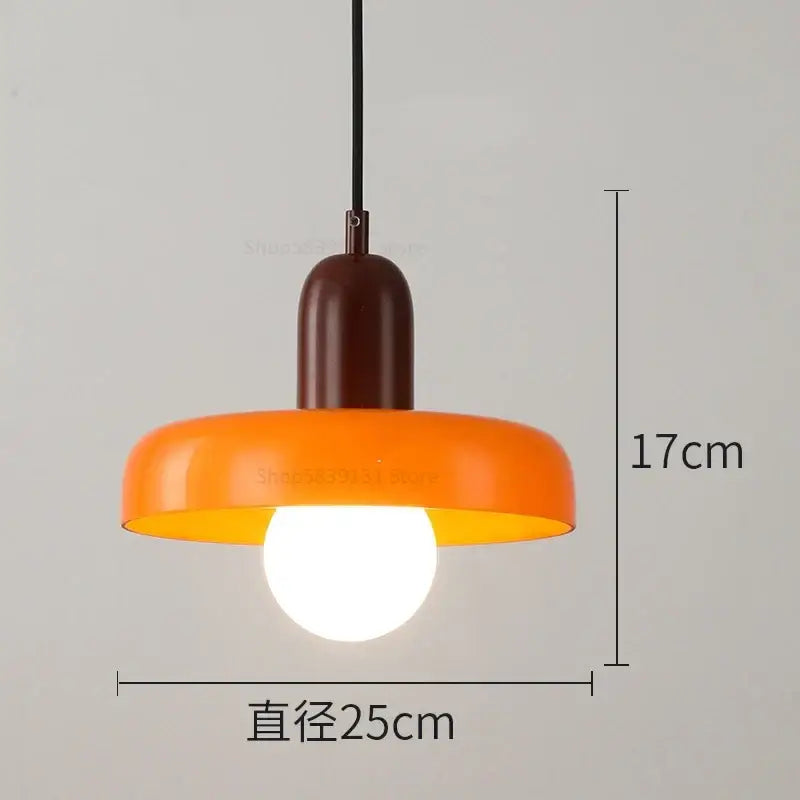 Modern green and white colorful glass pendant lights featuring a vibrant orange pendant light with matte brown top decorbites colorful glass
