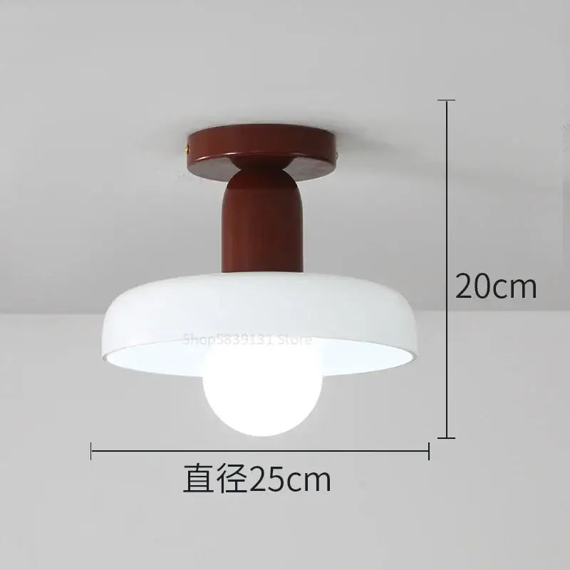 A modern pendant light with a matte brown metal base and white frosted colorful glass pendant shade for dining room decorbites colorful glass