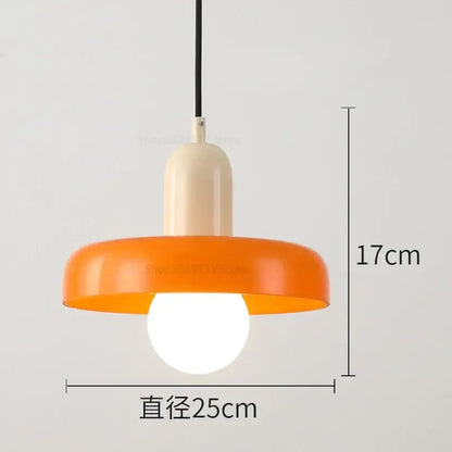A modern pendant light with a vibrant orange glossy shade and cream stem from decorbites colorful glass pendant lights collection
