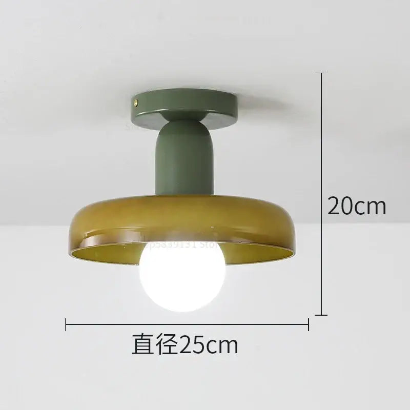 Modern green and white colorful glass pendant lights featuring an olive green and mustard yellow matte finish from decorbites colorful glass pendant collection