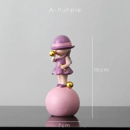 Modern green and white polka dot bubble gum blowing statue featuring a purple resin girl holding golden spheres for living room decor