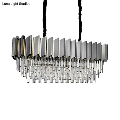 Modern grey crystal pendant chandelier with sleek metallic frame and cascading prisms for kitchen island lighting