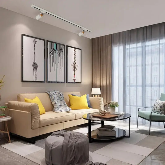 Modern gu10 7w led track light illuminating beige leather sofa with yellow and blue throw pillows in living room