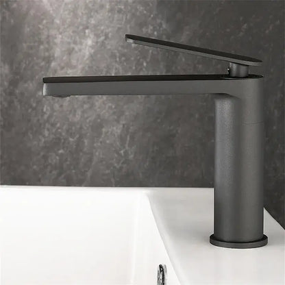 Modern gun gray basin faucet with matte black finish and sleek cylindrical base for bathroom decorbites gun gray tap