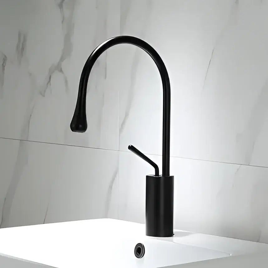 Modern gun grey brass basin faucet with black matte finish curved spout and cylindrical base by Decorbites gun grey