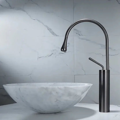 Modern gun grey brass basin faucet by decorbites with a sleek curved matte black swivel spout and cylindrical base