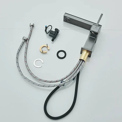 Modern gun grey basin faucet with matte black and brushed brass accent and braided chrome hoses decorbites gun grey