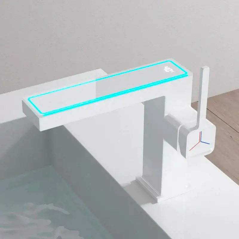Modern gun grey basin faucet with sleek white spout, turquoise led strip, and temperature sensor control knob by decorbites gun grey