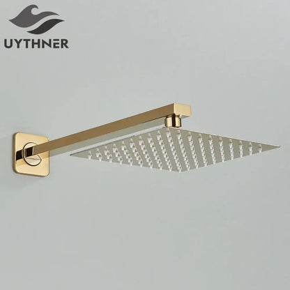 Gold-finished modern hammered square wall mounted shower head with brushed metal surface and sleek design