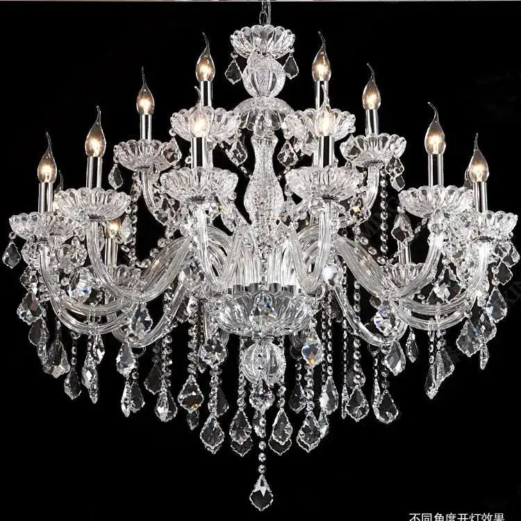 Modern hand blown crystal chandelier light with intricate glass arms and teardrop crystals for dining room use