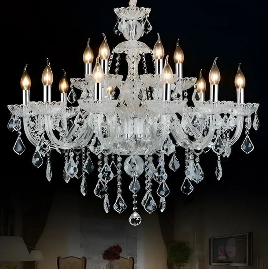 Modern hand blown crystal chandelier light with clear glass arms and teardrop crystals for dining room illumination