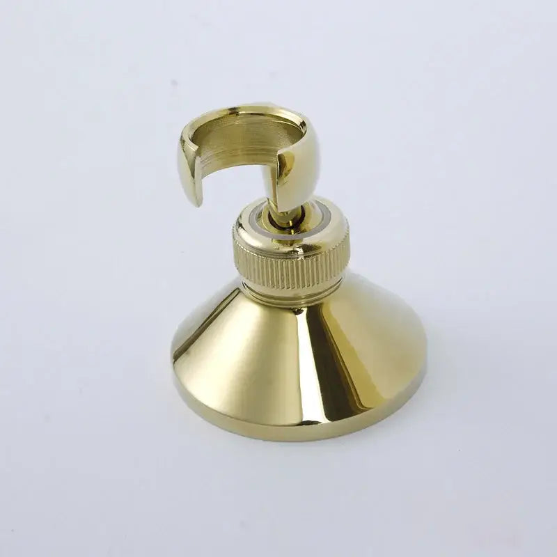 Gold-colored brass modern handshower bracket wall mounted holder with flared base and textured knob by decorbites