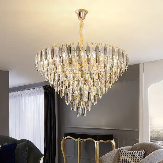 Modern heart shaped gold decorbites crystal chandelier with cascading clear and gold toned glass prisms for living room