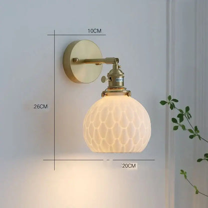 Vintage-style brass modern honeycomb ceramic led wall sconce with frosted glass globe for bedroom decorbites ceramic led lighting