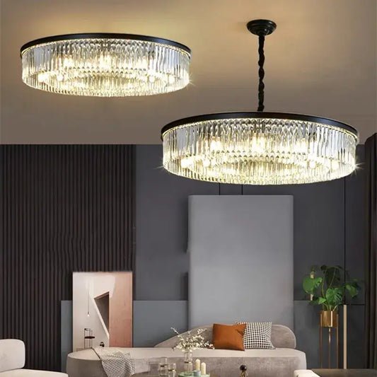Two elegant decorbites crystal ceiling chandeliers with black metal frames and cascading clear glass prisms for dining room