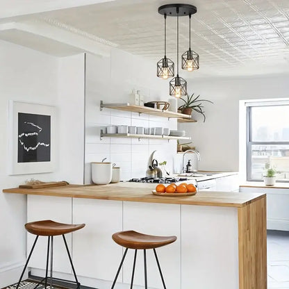 Black metal finish pendant chandelier with cage lights and warm bulb illumination for dining room lighting