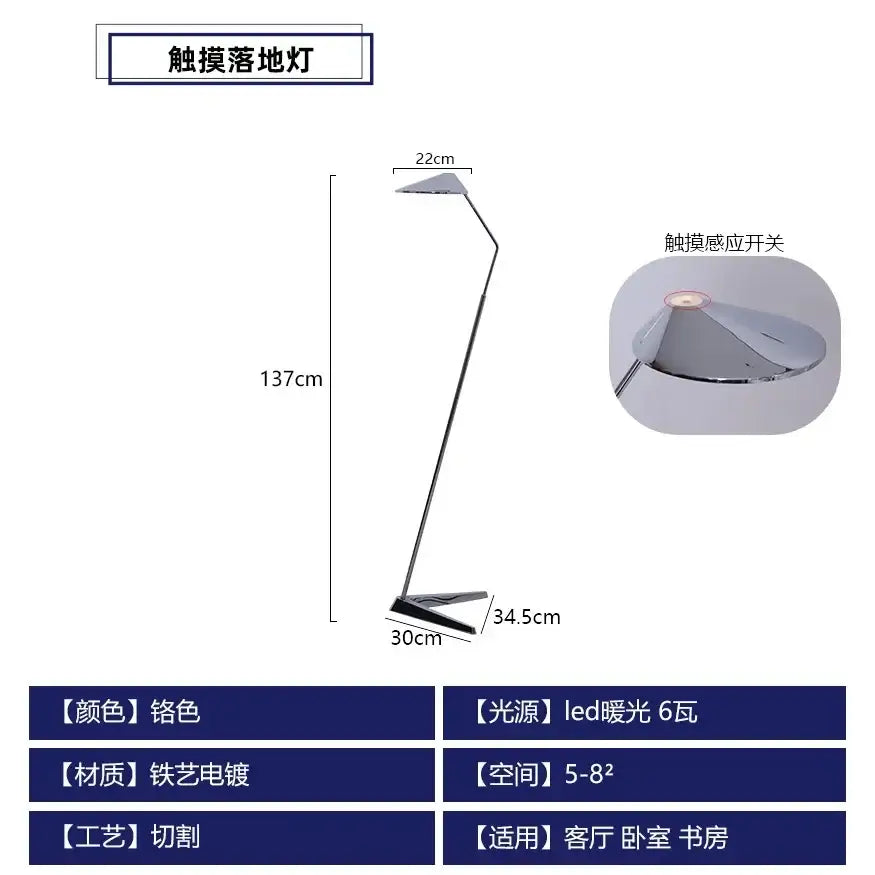 A sleek silver floor lamp with touch-sensitive warm led light featuring modern angular decorbites iron art decorative design