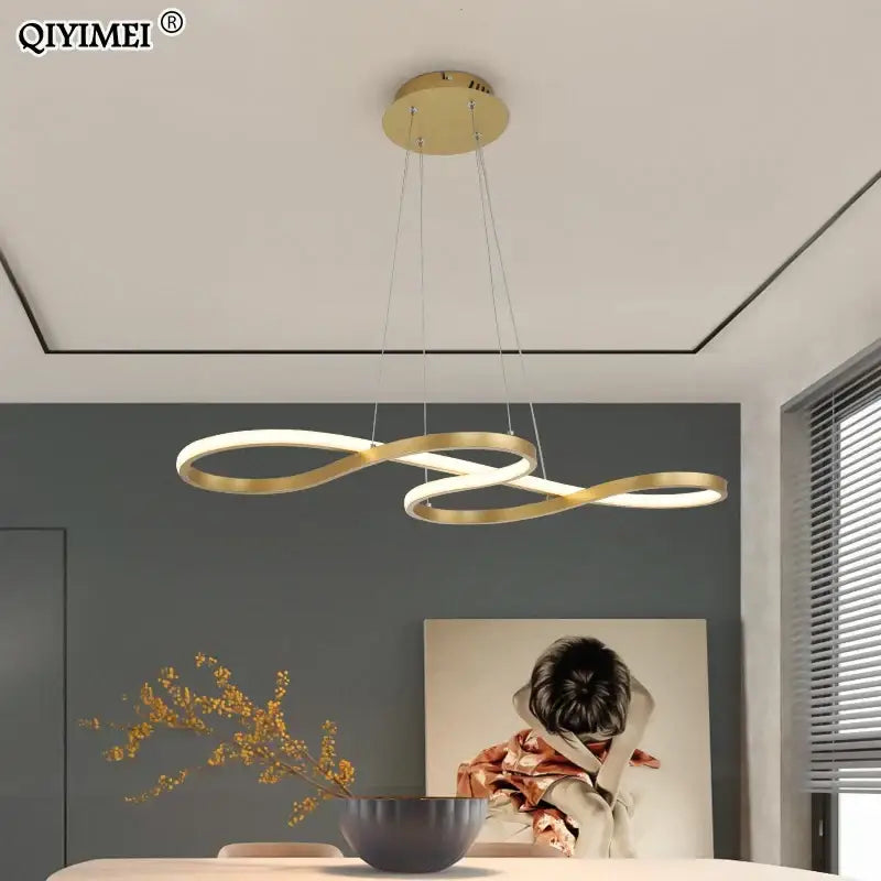 Modern infinity loop gold led pendant light featuring a sleek gold led pendant design for dining room decorbites gold led decor