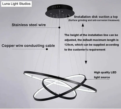 Modern black circular led pendant lights with sleek interlocking rings and stainless steel wire suspension for dining room