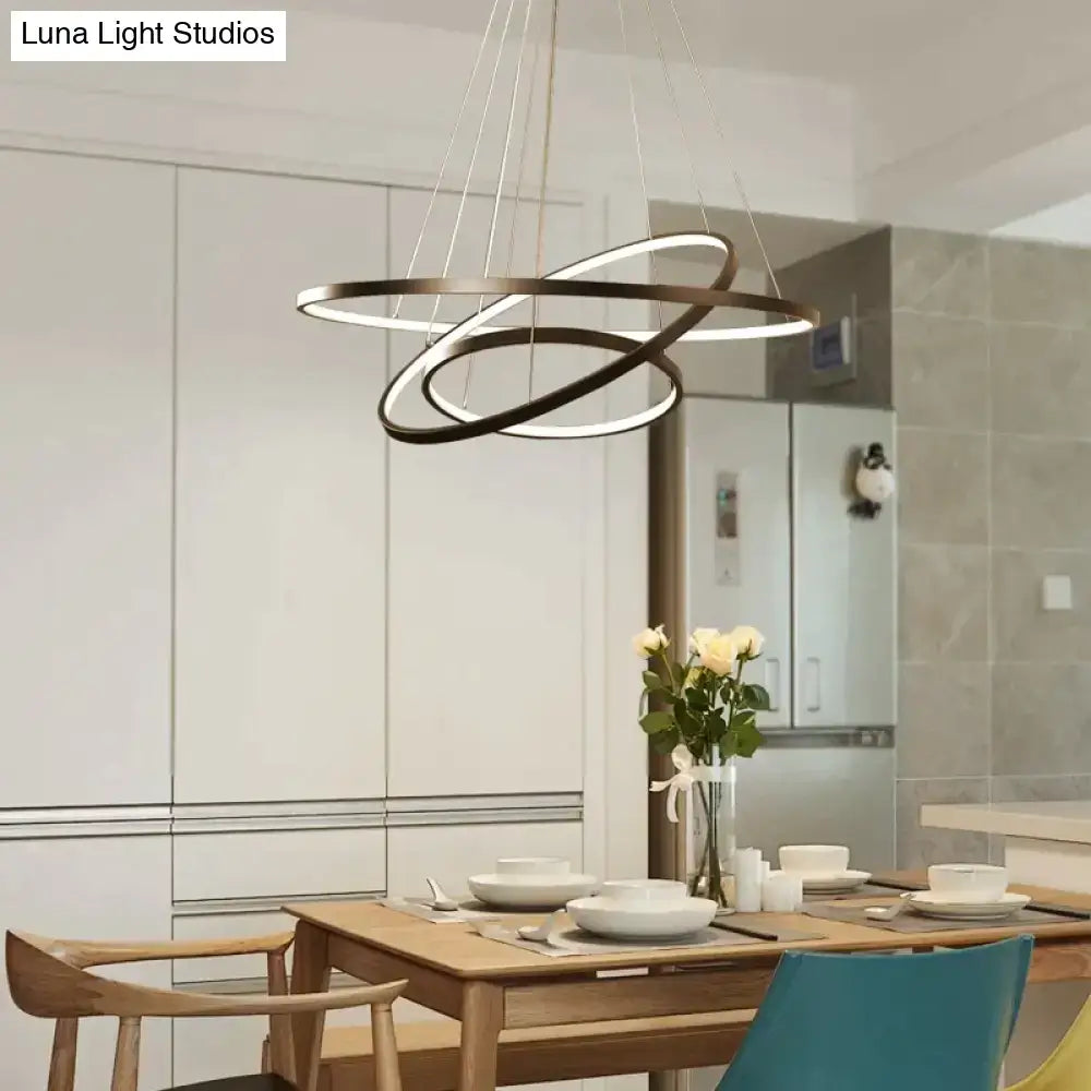 Modern black and white led pendant lights with interlocking circular rings for dining room modern pendant lighting
