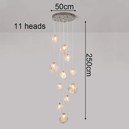 Modern iron and glass pendant light with eleven cascading crystal glass lights on a sleek metallic base as a dining room statement piece and focal point