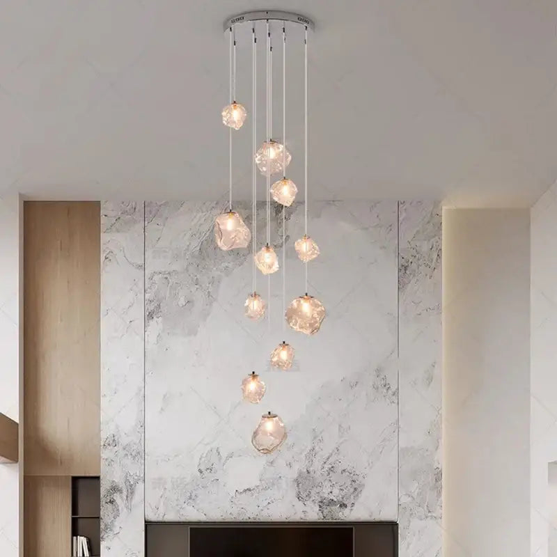 Modern iron and glass 6 light pendant light with crystal faceted globes as a dining room statement piece focal point