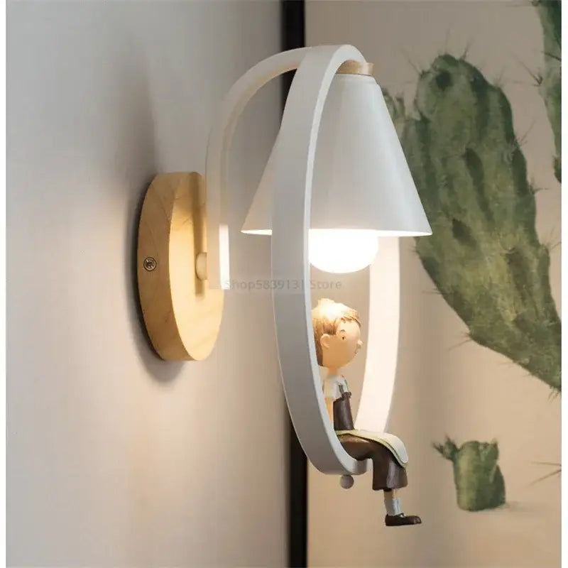 White and wood iron led wall lamps with curved cone shade and boy figurine for modern bedroom decorbites iron led design