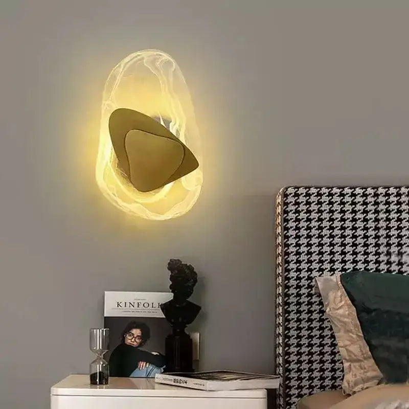 Modern irregular graphic wall light with warm frosted glass diffuser and gold-toned metal accents for bedroom decorbites irregular graphic wall