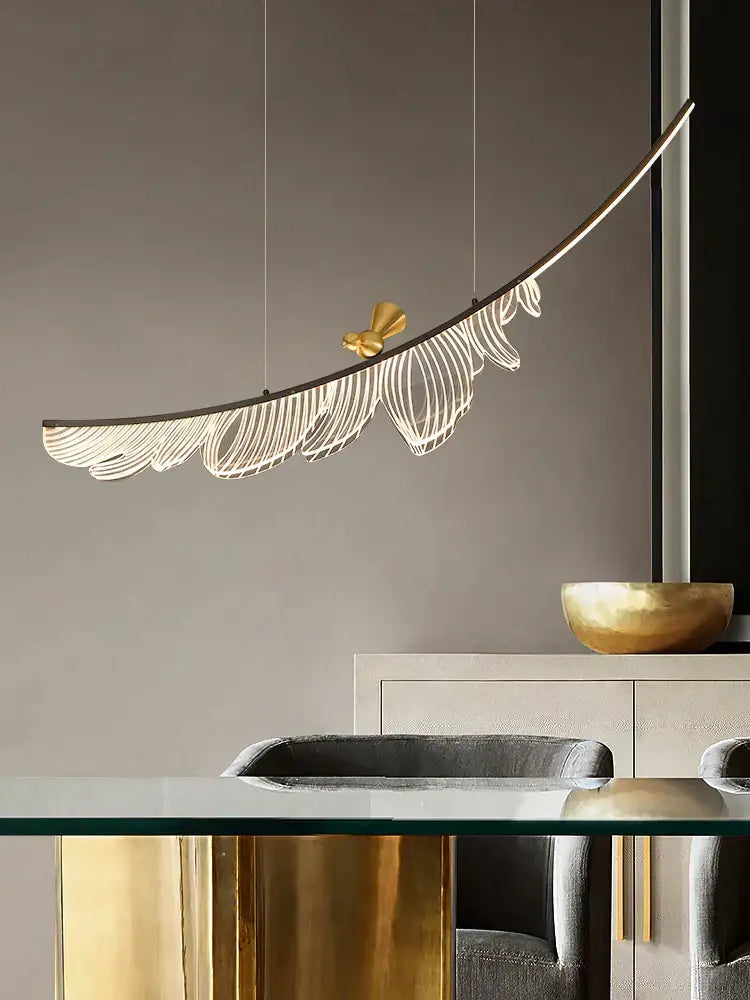 A sleek modern italian copper chandelier gold bird pendant light with curved design and feather-like led strips for dining room decorbites italian copper